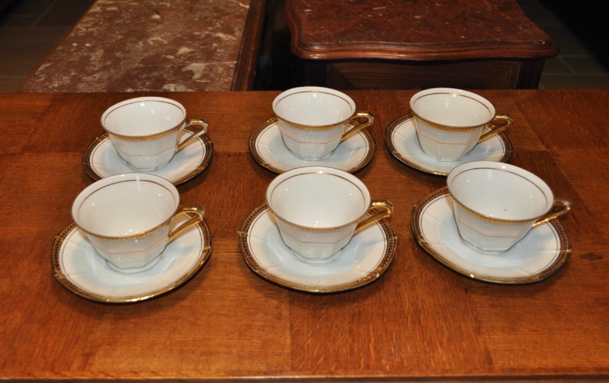 White And Gold Porcelain Coffee Service Consisting Of 6 Limoges Cups And Saucers?