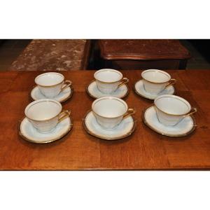 White And Gold Porcelain Coffee Service Consisting Of 6 Limoges Cups And Saucers?