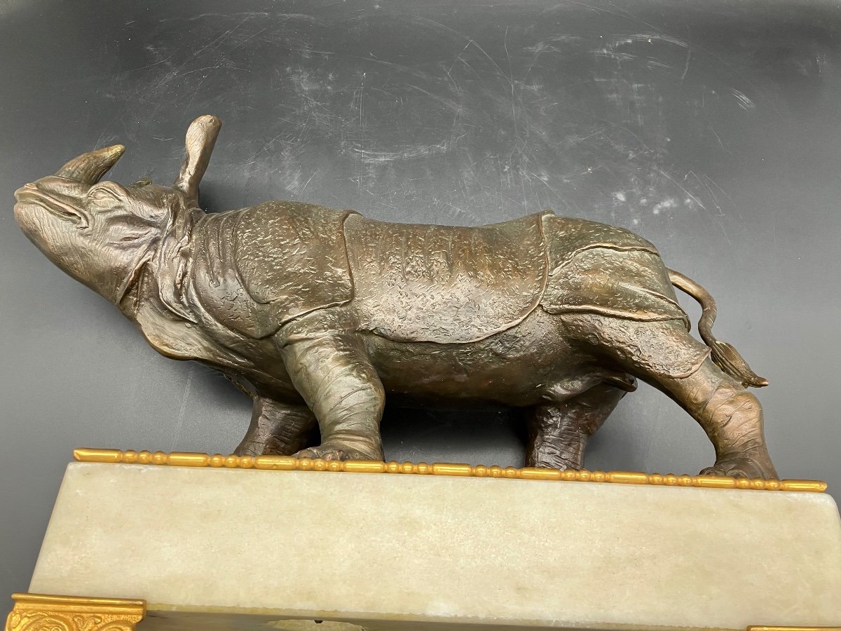 Bronze Rhinoceros On White Marble Base -photo-5