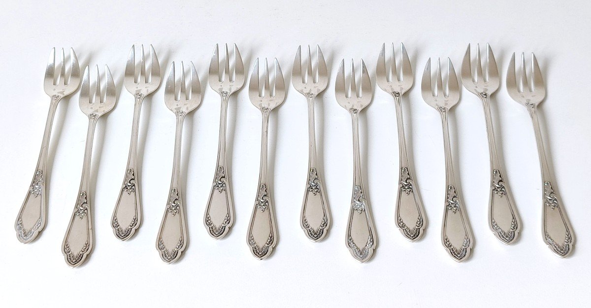 Douze fourchettes à huitres en argent massif -photo-3