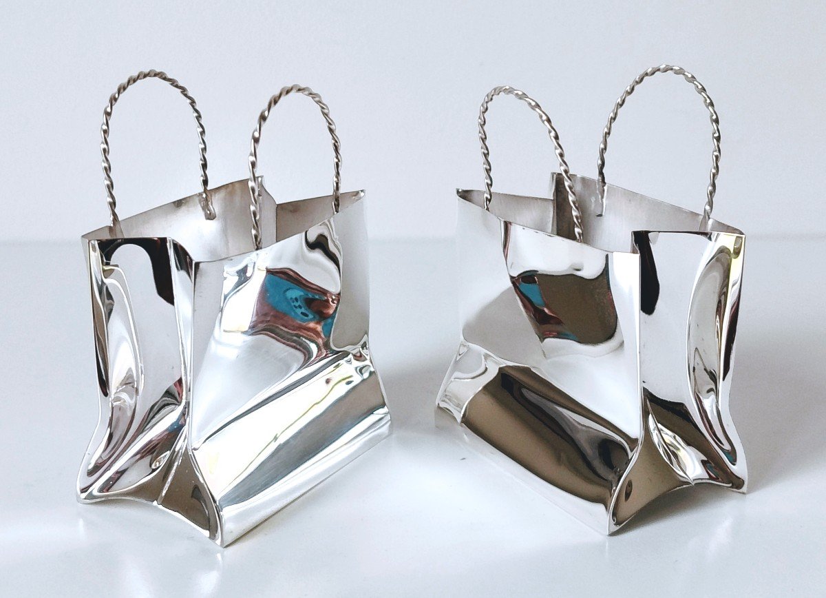 A Pair Of Cartier Solid Silver Miniature Bags 