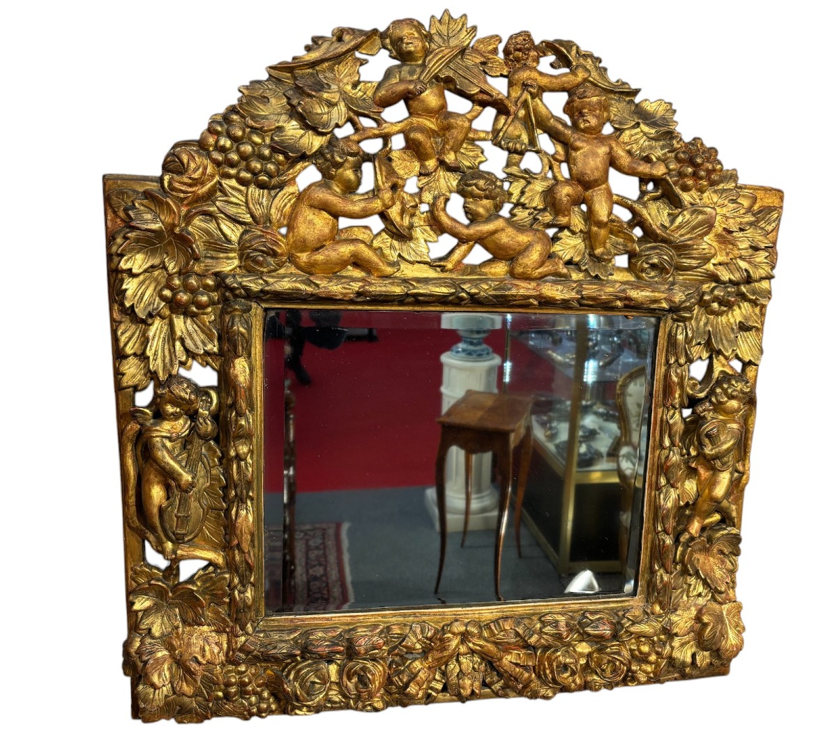 Gilded, Carved And Openwork Wooden Mirror With Musical Putti, 18th Century