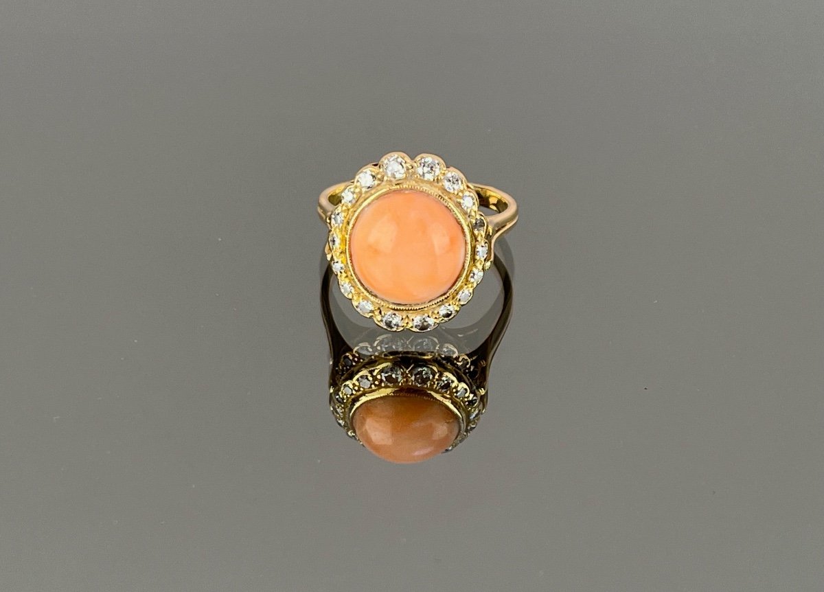 Gold Ring Adorned With A Coral Surrounded By Diamonds-photo-7