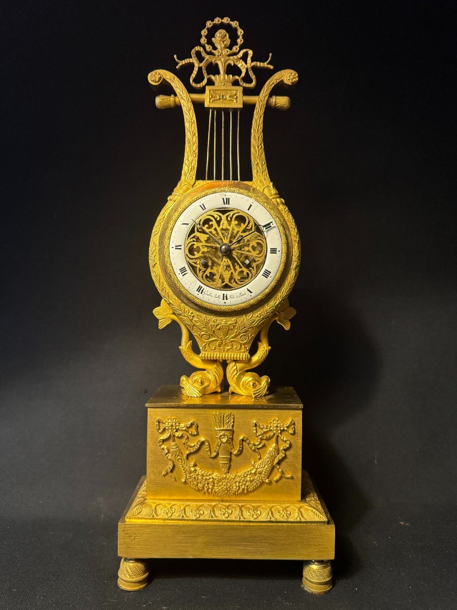 Empire Period Clock Lyre With Dolphins In Gilded Bronze