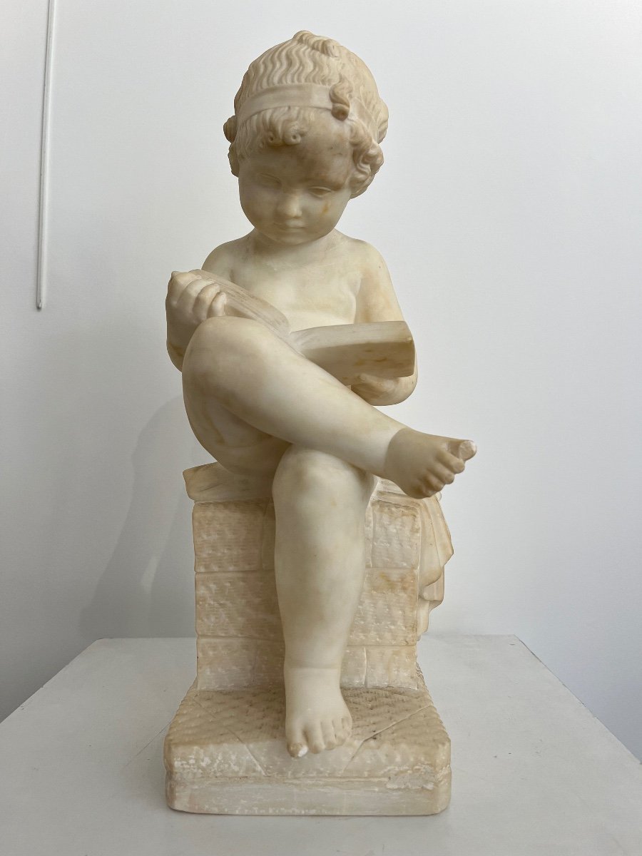 Child Reading In Carrara Marble 