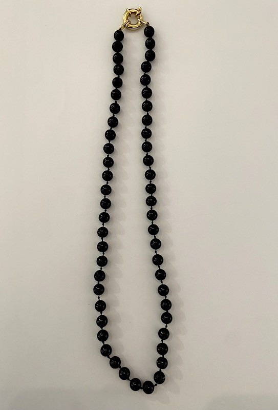 Collier perles noires et attache en or 18k