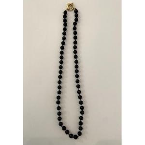 Collier perles noires et attache en or 18k