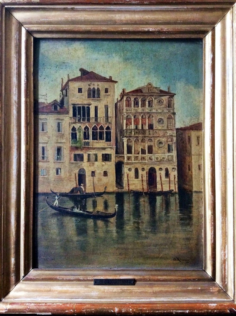 View With Gondoliers On Venice Grand Canal And Palazzo Ca'dario