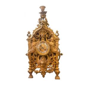 Table Clock With Richly Chiseled Bronze Case. 19th Century