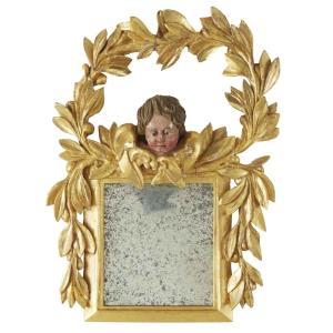 Italian Carved And Gilt Wood Mirror Topped By Garland And Putto 1800s