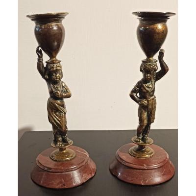 Pair Of Candlesticks In Gilt And Patinated Bronze