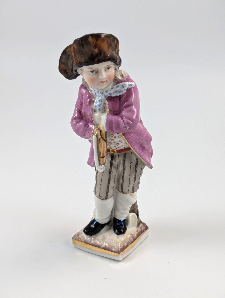 Antique Sitzendorf Porcelain Figurine Of Skater With Skate, 1885.