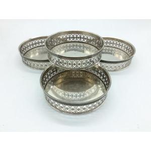 4 Silver Bottle Coasters, 20th Century.