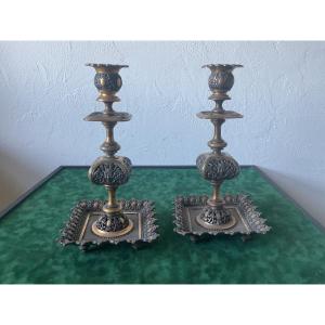 Pair Of Candlesticks In Patinated And Gilded Bronze 