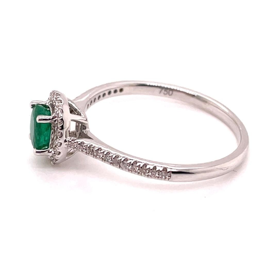 White Gold Emerald Ring Surrounded By Diamonds-photo-2