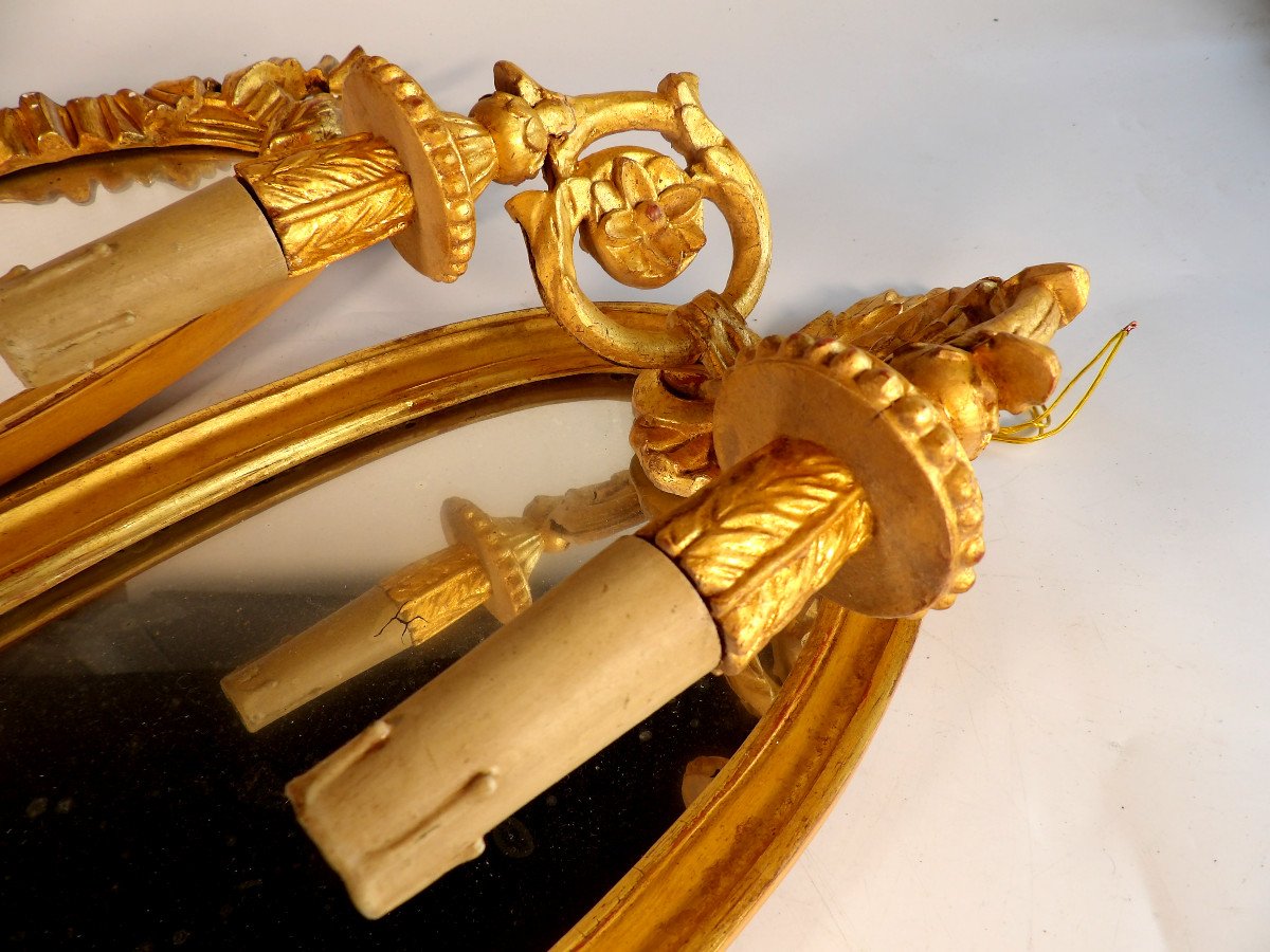 Paire d'appliques-miroir en bois doré électrifiées-photo-1