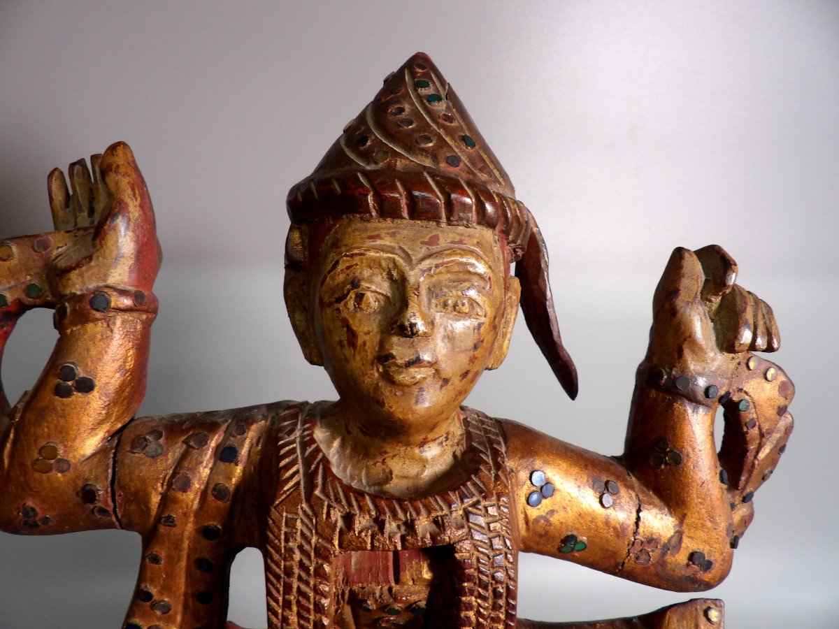 Ethnic Sculpture In Golden Wood-photo-2