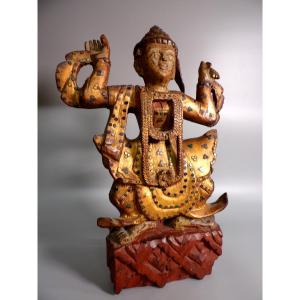 Ethnic Sculpture In Golden Wood