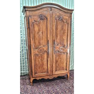 Louis XV Carved Cherry Wood Molded Wardrobe From The 18th Century. 