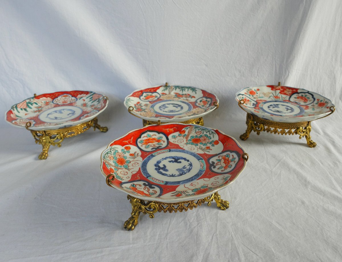 Set Of 4 Japanese Porcelain Bronze Mounted Plates With Imari Decor