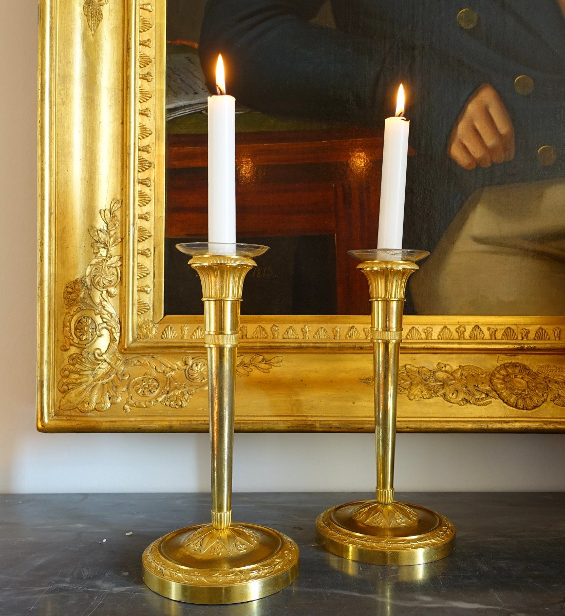 Pair Of Empire Period Mercury Gilt Bronze Candlesticks