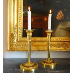 Pair Of Empire Period Mercury Gilt Bronze Candlesticks