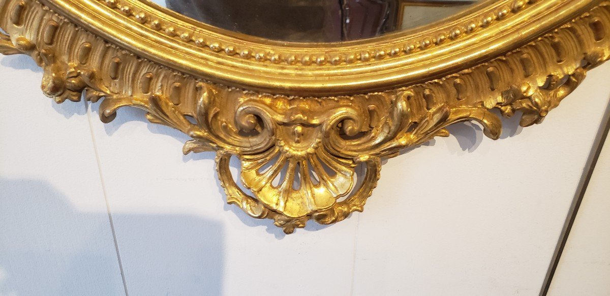Miroir ovale en  bois et stuc doré fin XIXème -photo-1