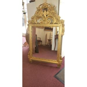 Miroir en bois sculpté-doré / style Louis XVI