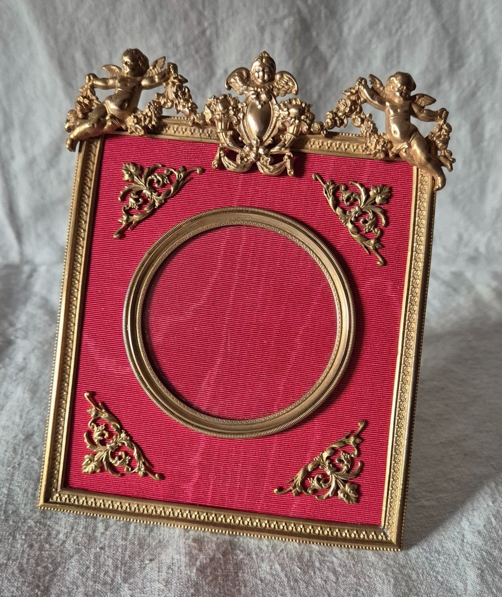 Gilded Bronze Photo Frame With Cherub Decor And Red Moire Mat 