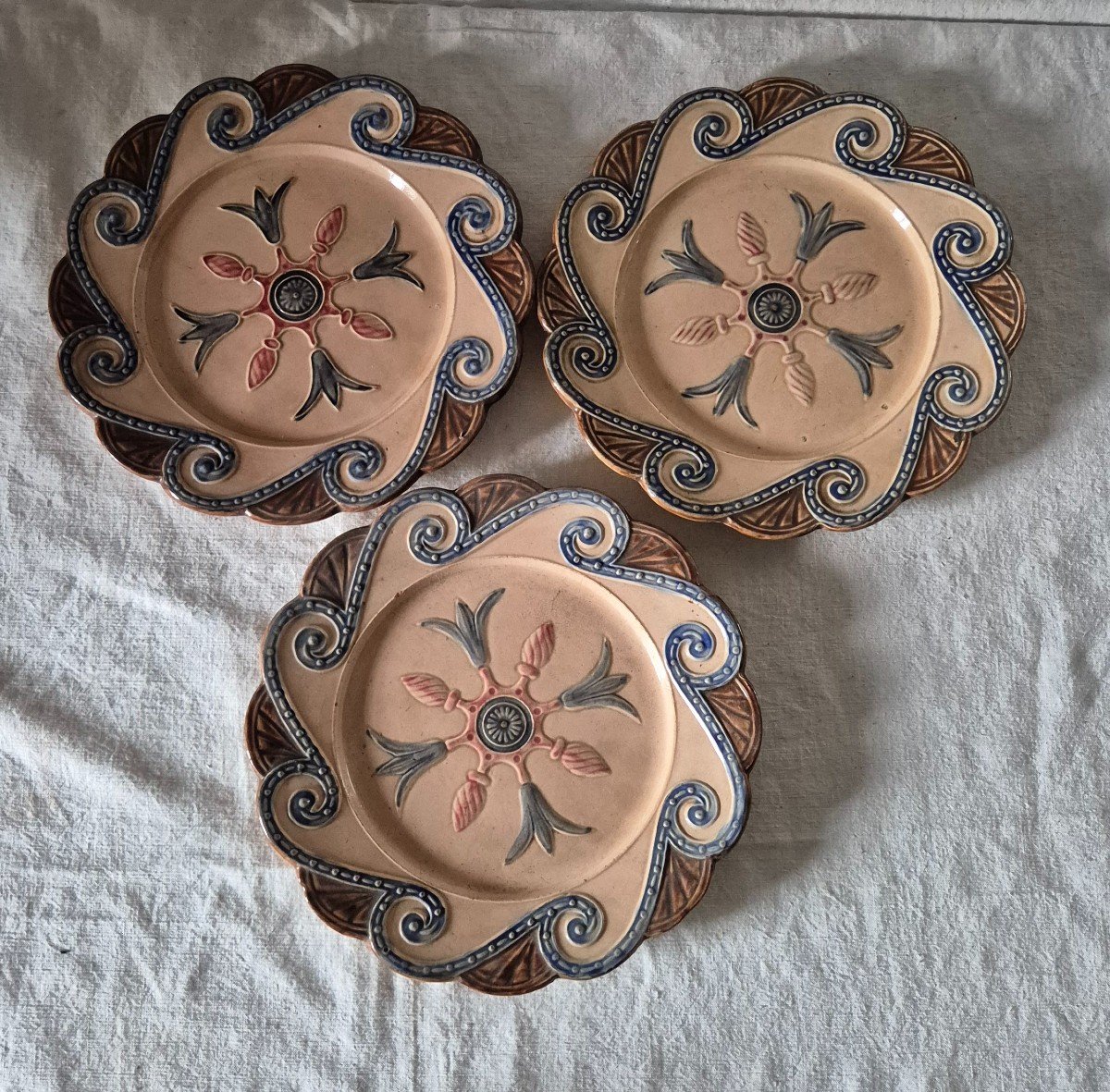 Three Barbotine Plates With Greek Wave Decor And Renaissance-style Rosette 