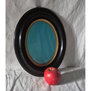 Large Oval Napoleon III Frame In Blackened Wood With Worked Pomponne Hooping 