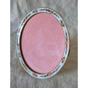 Round Bronze Photo Frame With Roses On White Enamel Background 