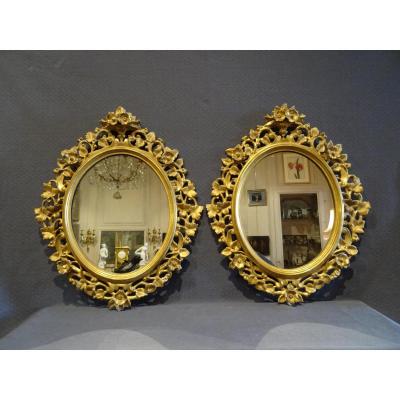 Paire de miroirs en bois doré XIX eme