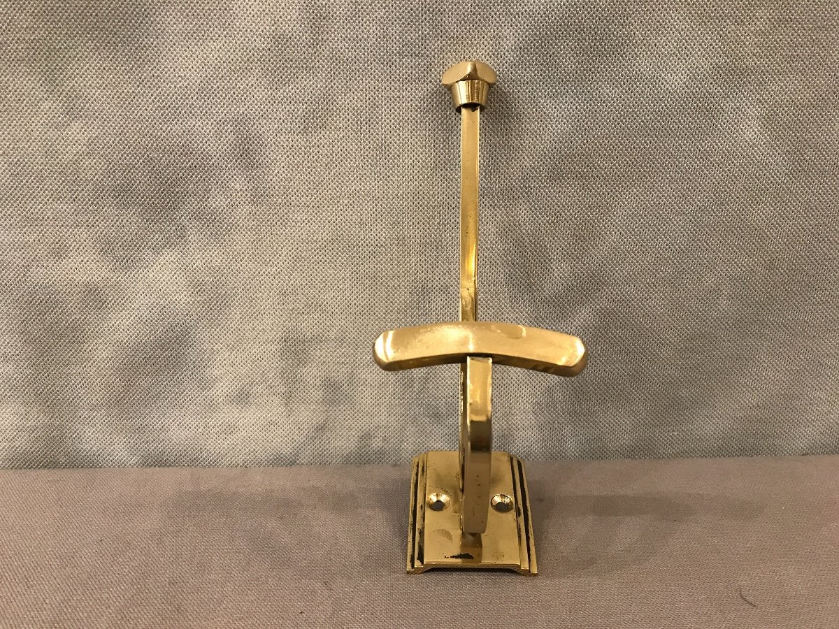 Coat Hook In Polished Brass And Vintage Varnish Around 1900.-photo-1