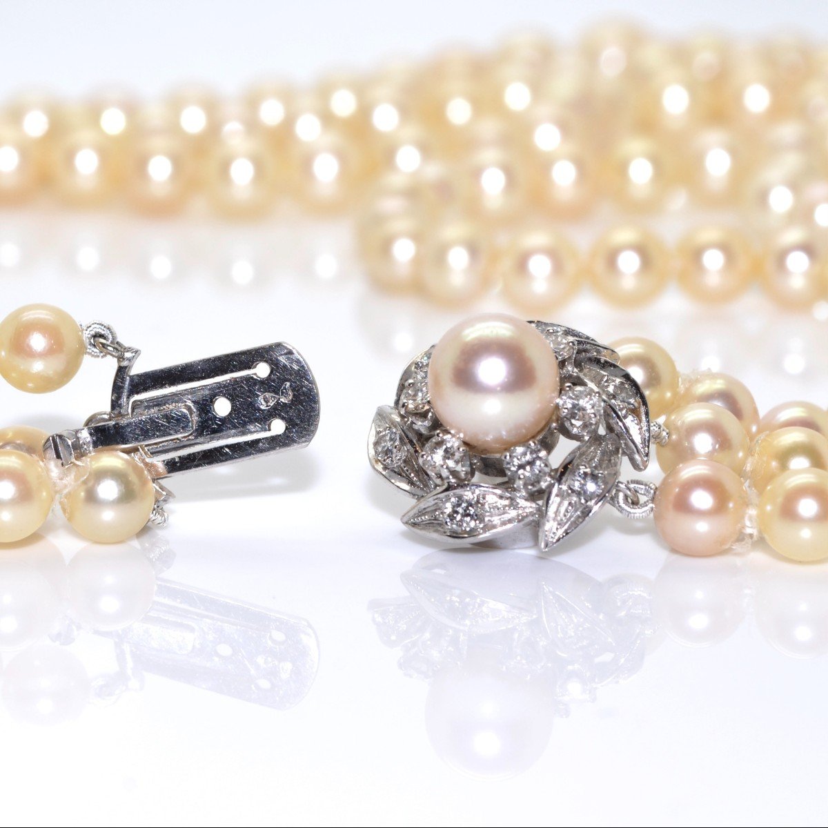 Triple Strand Pearl And Diamond Necklace-photo-3