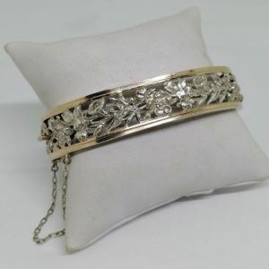 Silver Bracelet, Openwork Bangle With Flower Motif, Circa 1900.