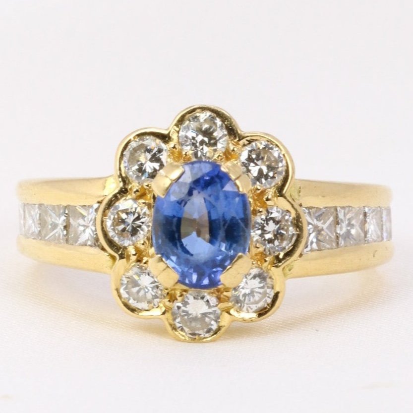 Vintage Marguerite Ring In Gold, Oval Sapphire And Diamonds