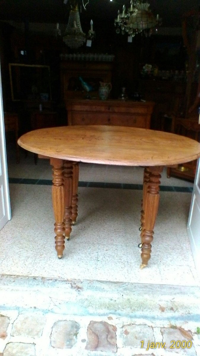 Six-leg Oak Table With Two Extensions.-photo-4