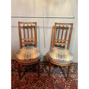 Pair Of Louis XVI Style Chairs In Walnut.