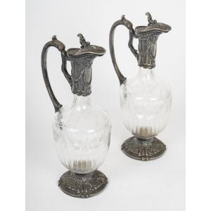 Pair Of Engraved Crystal Carafes With A Silver Metal Frame.