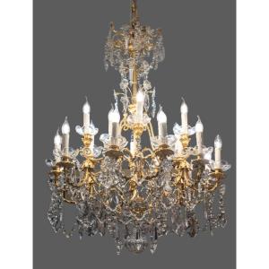 Chandelier In Gilt Bronze And Crystals