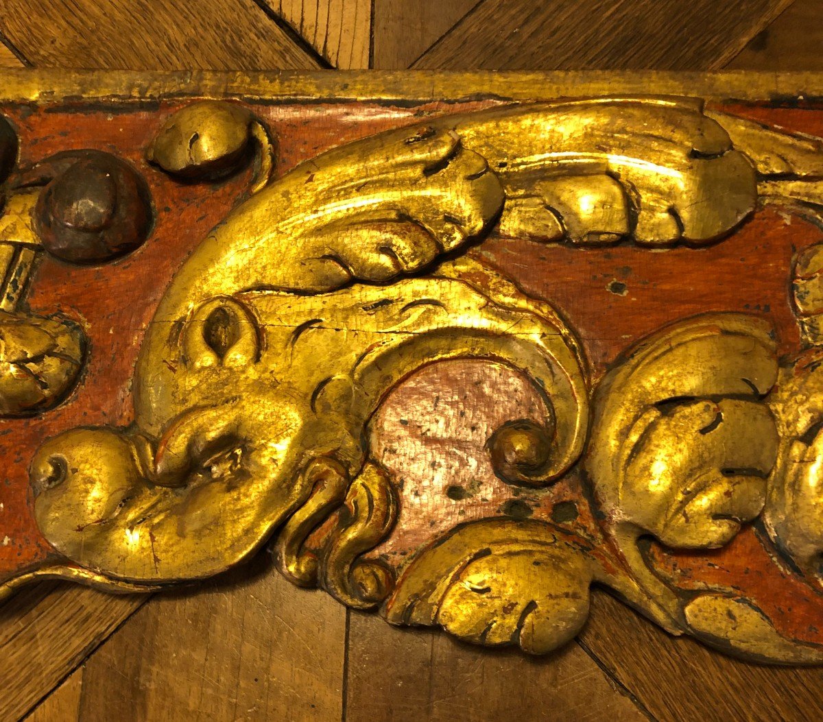 Carved Wood With Golden Dolphins On Red Background -photo-1