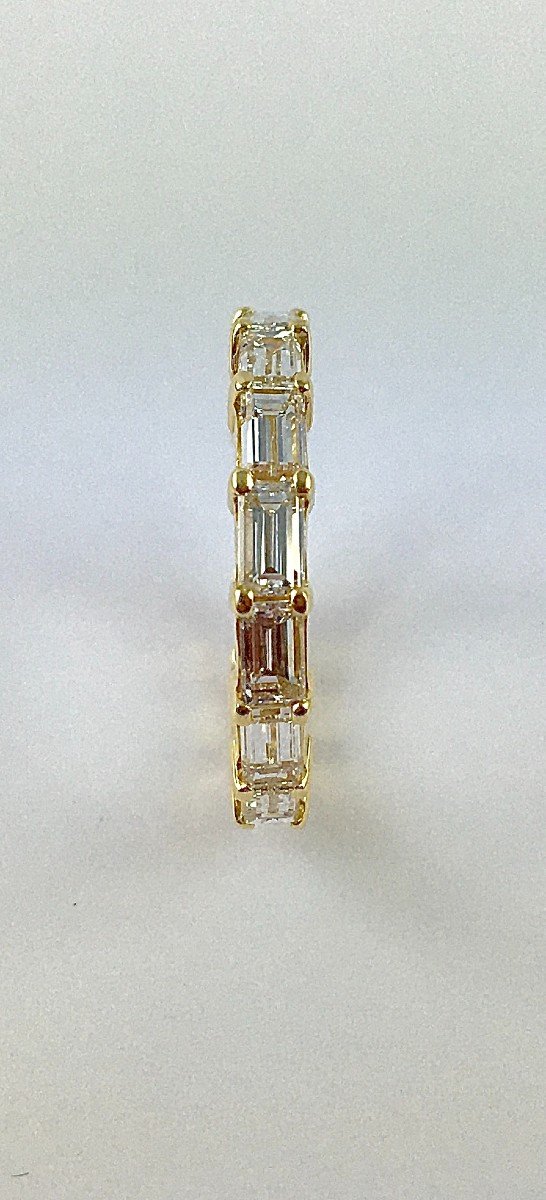 American Alliance Ring With Baguette Cut Diamonds In Yellow Gold -photo-1