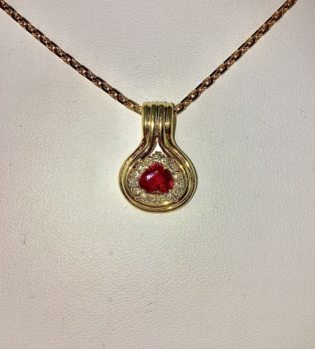 Ruby Drop Pendant Surrounded By Diamonds On Yellow Gold-photo-2