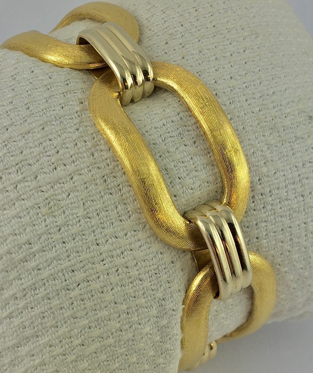 Large Oval Guilloche Link Bracelet In Yellow And White Gold