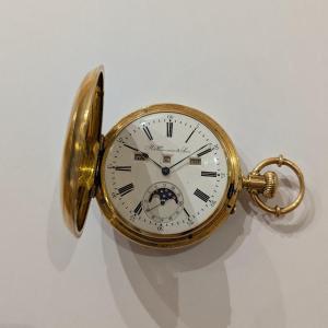 M. Huguenin & Fils Pocket Watch. 18 Carat Gold.