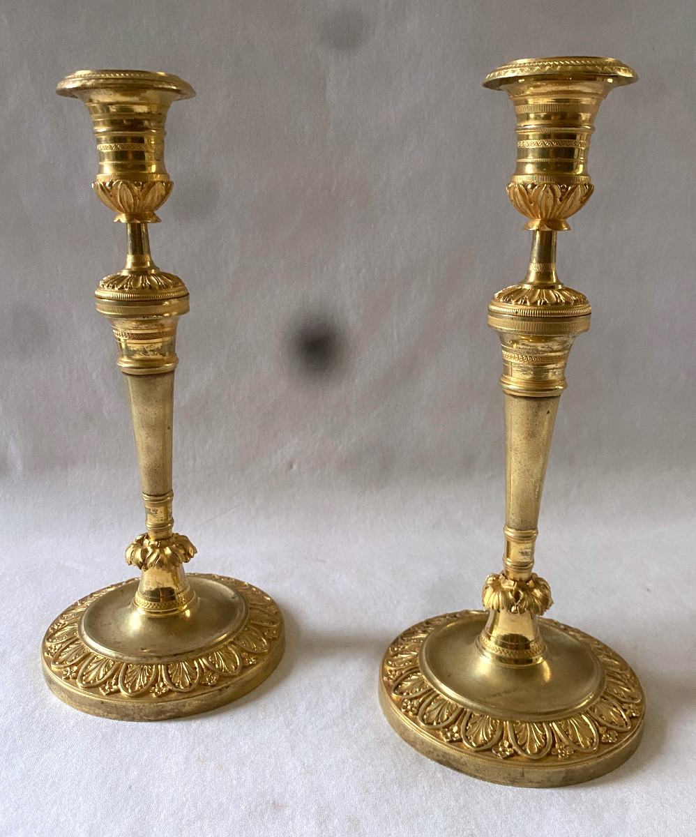 Pair Of Directory Candlesticks In Gilt Bronze