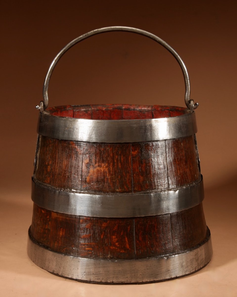 An Oak And Wrought Iron Bound Coopered Ships Bucket.-photo-1