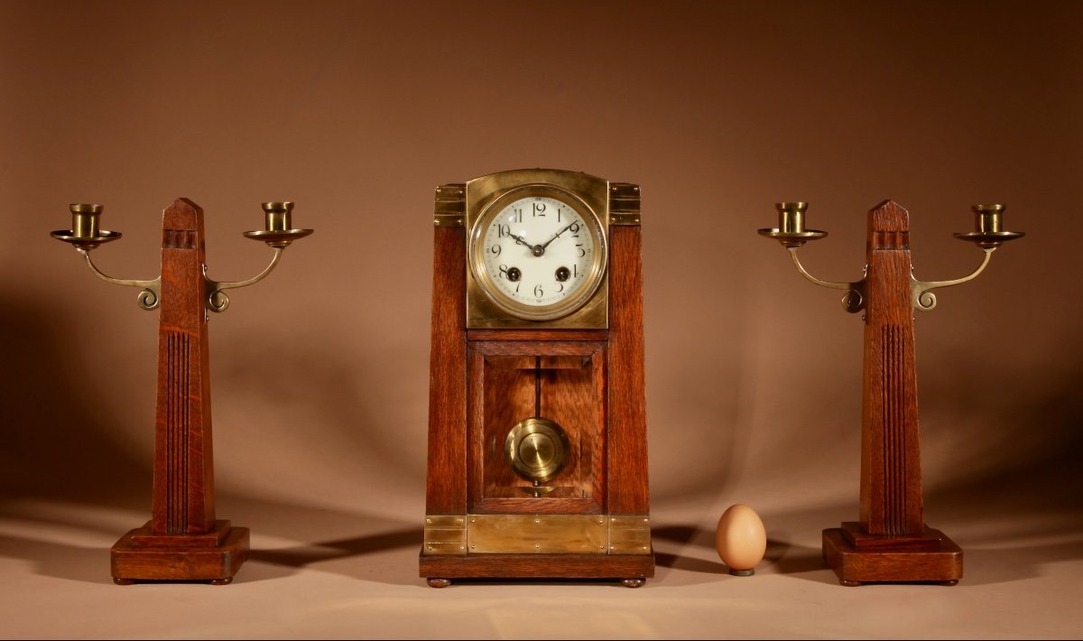 Gustav Serrurier-bovy (1858-1910) A Rare Oak And Brass Clock Garniture, Circa 1900-10.