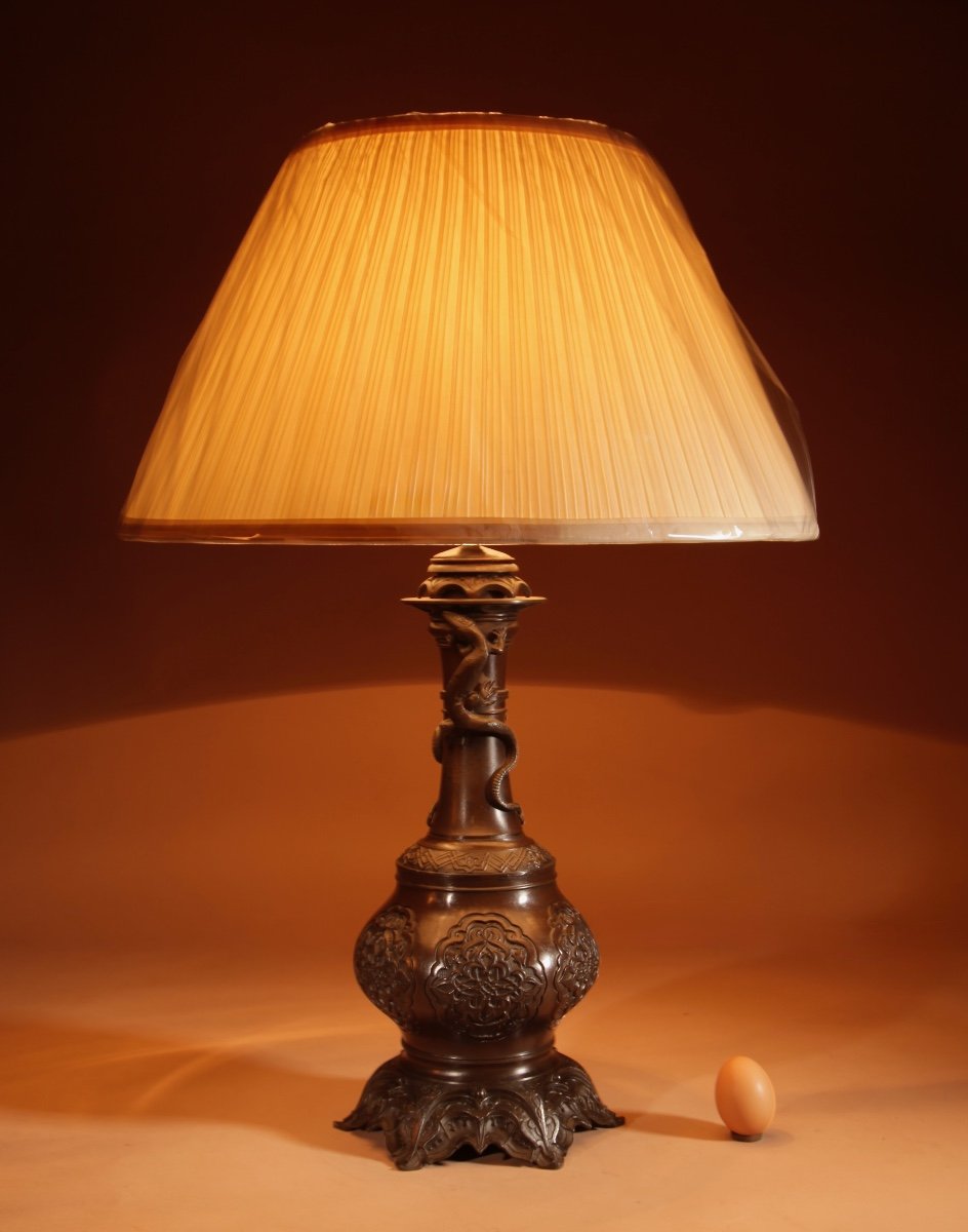 A French Original Patinated White Metal Table Lamp In The Chinese Taste.